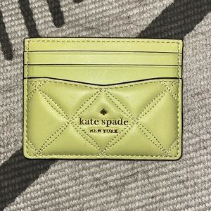 Yellow quilted Kate Spade card holder